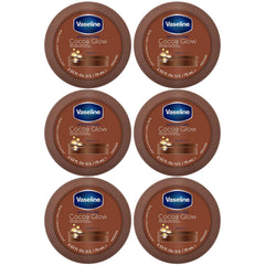 Vaseline Cocoa Glow pack shot with six travel-size tubes for soft skin.