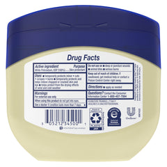 Open Vaseline jar close-up of smooth white jelly texture for skin protection