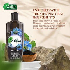 Vatika Naturals Dabur Enriched Black Seed Hair Oil applied through hair for smoothness and manageability.