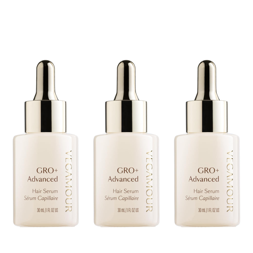VEGAMOUR GRO+ bottle close-up showing a lightweight serum for daily use.