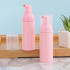 VEIDIA pink PET plastic bottles show premium reusable travel containers.