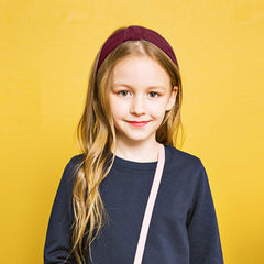 VELSCRUN bohemian style headband adds colorful accessory.