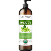 Velona Amla Oil bottle pour shows pure organic oil ready for deep moisture and healthier hair