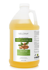 Velona Sweet Almond Oil bottle 64oz showing pure carrier oil for soft, hydrated skin.