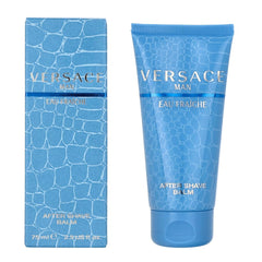 Versace Man Eau Fraiche After Shave Balm bottle being poured for a refreshing post-shave ritual
