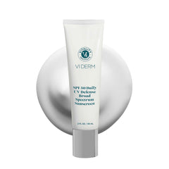VI DERM SPF50 Daily UV Defense bottle shows clean, fragrance-free sun protection.
