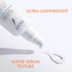 VICHY tube beside a hand showing size for daily facial use and portability