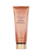 Victoria's Secret Amber Romance lotion packaging close-up for fragrance layering.