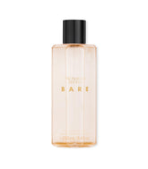 Victoria's Secret Bare Fragrance Mist bottle closeup showcasing woody floral scent notes