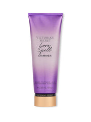Victoria's Secret Love Spell lotion bottle glows with shimmer for radiant skin