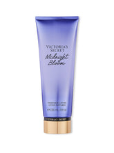 Victoria's Secret Midnight Bloom fragrance-lotion bottle showcases warm floral scent and daily moisturization.
