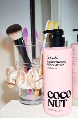 Victoria's Secret Pink Coco Hydrating Coconut Oil ingredient feature for rich skin-softening.