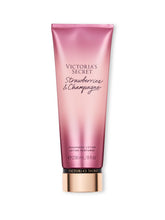 Victoria's Secret Strawberries & Champagne Fragrance Body Lotion bottle offers day-long scent.