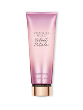 Victoria's Secret Velvet Petals lotion bottle closeup for daily moisturizing glow.