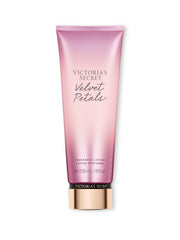 Victoria's Secret Velvet Petals lotion bottle closeup for daily moisturizing glow.