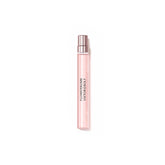 Viktor&Rolf Flowerbomb travel-size bottle highlighting jasmine and rose for day-to-night versatility.