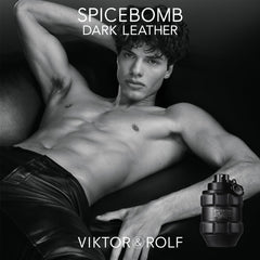 Viktor&Rolf Spicebomb Dark Leather bottle in use for warm pulse-point application and lasting scent.
