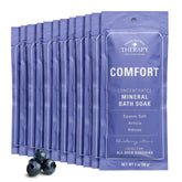 Village Naturals Therapy comfort mineral bath packets closeup for on-the-go soothing relief.