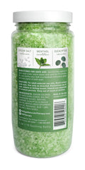 Village Naturals Therapy soak being poured highlights eucalyptus mint aroma for a refreshing, muscle-relaxing soak