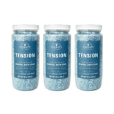 Village Naturals Therapy Tension Bath Soak Cedar Citrus bottle shows calming aroma ideal for a relaxing soak