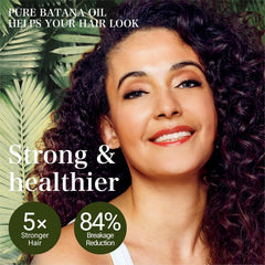 VIMOZA Batana Oil bottle closeup highlights rich golden oil for nourishing scalp