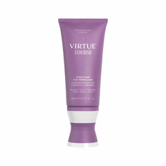 Virtue Flourish conditioner bottle demonstrates lightweight detangling for thinning hair.