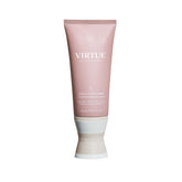 Virtue Smooth Conditioner bottle pours, signaling frizz-control prep in your shower routine.