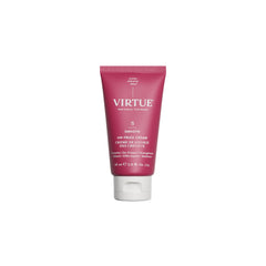 Virtue Un-Frizz leave-in bottle closeup for smooth frizz control in humidity.