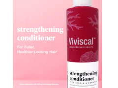 Viviscal densifying conditioner squeeze pump demonstrating easy application for stronger, less tangled hair.