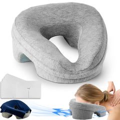 VVB face-down pillow headrest on bed for comfortable prone sessions.