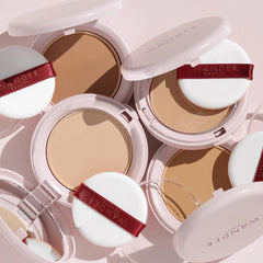 Wander Beauty Wanderlust Powder Foundation Medium skin swatch reveals natural soft-matte finish.