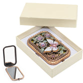 Warmtree vintage makeup mirror with foldable butterfly design for portable travel touchups.