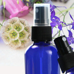 Wedama 2oz glass spray bottle blue mist supports plant care and textiles.