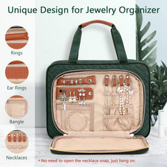 Wedama dark green toiletry bag open showing wide capacity for essentials