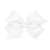 Wee Ones moonstitch edge bow on WeeStay clip for secure daily wear
