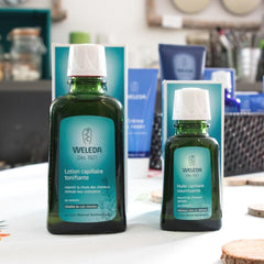Weleda Revitalizing Hair Tonic packaging display, easy daily use.