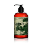 WEN Tea Tree Cleansing Conditioner bottle emphasizes soothing rosemary hydration for hair