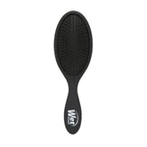 Wet Brush Original Detangler Black Frost in hand showing easy knot detangling.