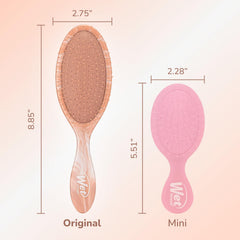 Wet Brush Original Detangler Pink brushing action on dry hair for pain-free detangling.