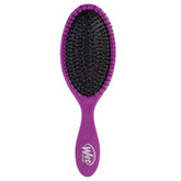 Wet Brush Original Detangler purple close-up with flexible bristles for painless detangling.