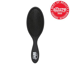 WetBrush Original Detangler bristle closeup highlights flexible bristles
