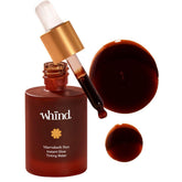 WHIND Marrakech Sun bottle front view shows compact travel-friendly packaging for glow on the go.