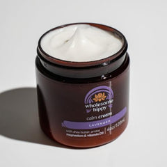 WHOLESOME HIPPY Calm Body Cream pump in use for easy, soothing application.