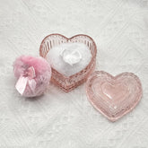WHSLILR glass heart powder puff container in pink keeps vanity organized and stylish.