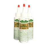 Wild Growth hair oil bottle pour demonstrates easy application for smoother, shinier hair.