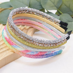 WJYX BOWS glitter headbands worn on a child for cute everyday styling