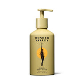 Wonder Valley Hinoki Body Wash bottle close-up showing a hydrating formula for all skin types.