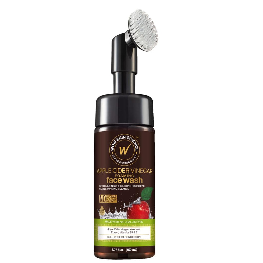 WOW Skin Science ACV foam face wash with brush demonstrates built-in pore cleansing power.