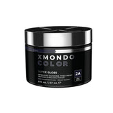 XMONDO Color Blue Black color-depositing mask shows vibrant gloss on hair.