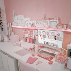 YMVV light pink display shelf brightens styling space.